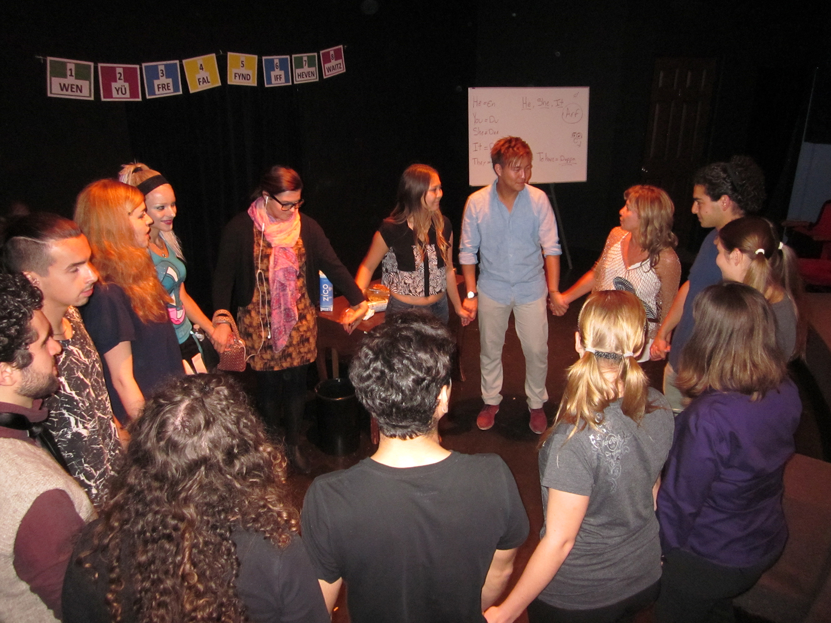 Students perform an excercise during one their acting classes